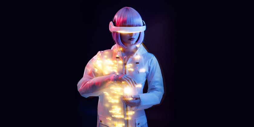 futuristic woman looking through AI glasses holding lighted sphere