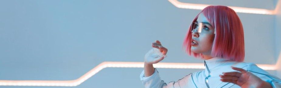 women with rose colored hair in futuristic costume