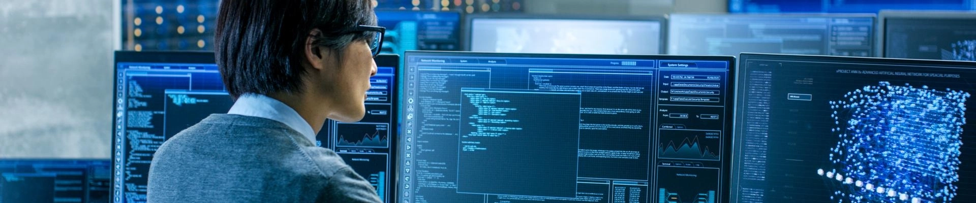In the System Control Room Technical Slider Final Operator Works at His Workstation