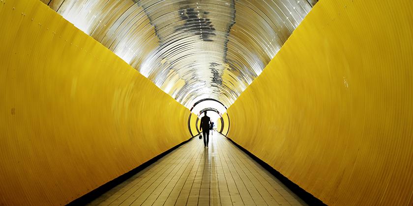 Walking in the yellow tunnel Stockholm Sweden