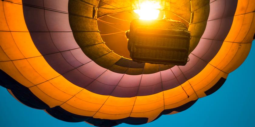 Balloon with basket seen from the ground