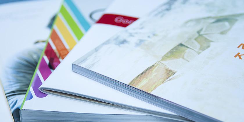 stacked and fanned out magazines