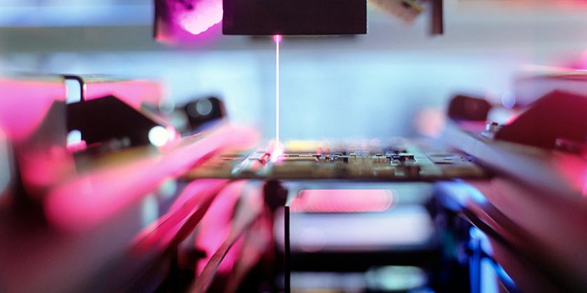 Robot making a printed circuit board