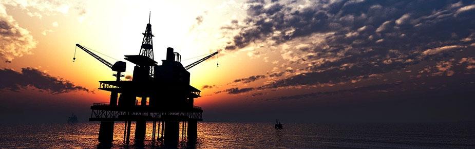 oil rig platform at sunset
