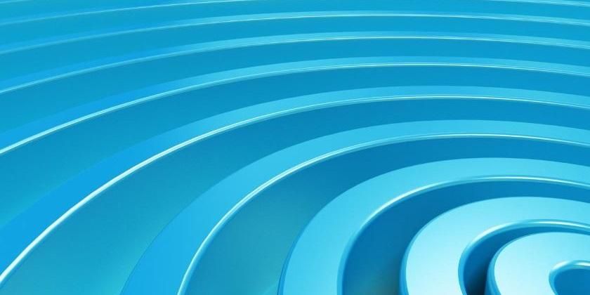 Blue concentric spiral on blue background - 840 x 420
