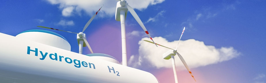 hydrogen tanker and windmills against blue sky