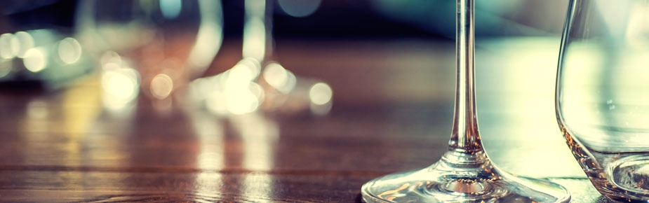 empty wine glasses on a wooden table