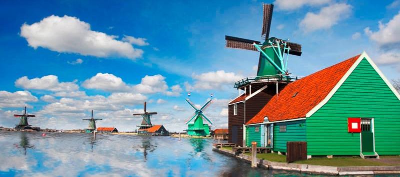 Traditional Dutch windmills with canal close the Amsterdam Netherlands