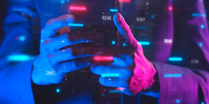 businessman with stock chart on mobile phone 840x420.jpg