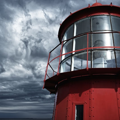 Lighthouse against a stormy sky