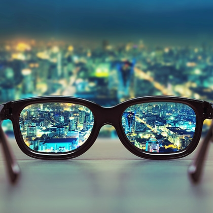 night cityscape focused in glasses