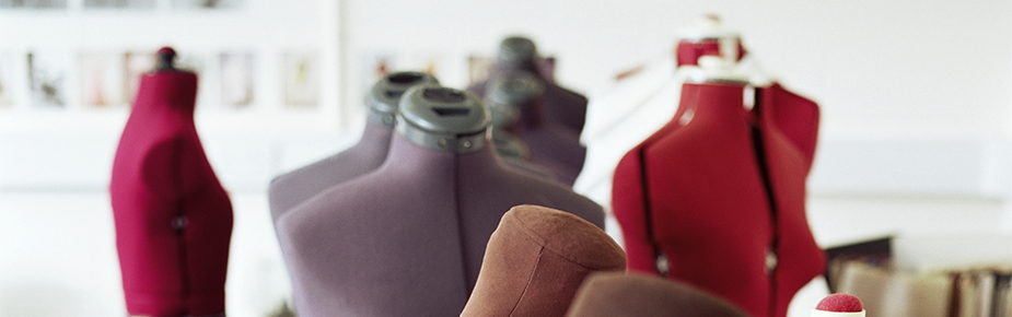 red, purple and brown tailor dummies