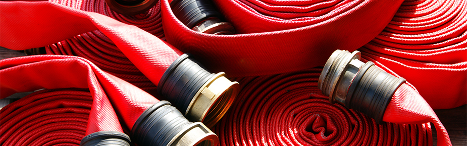 rolls of red fire hoses