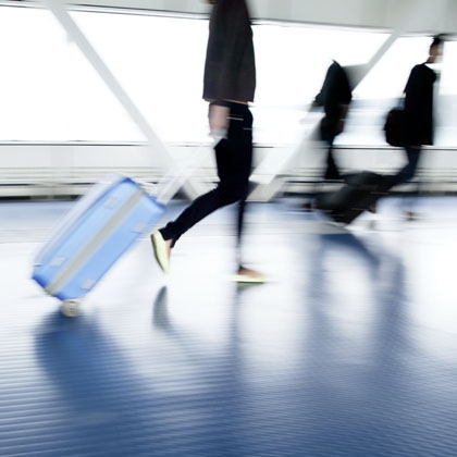Person pulling a suitcase