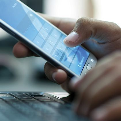 businessman holding smartphone