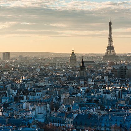 paris skyline sunset view with the eiffel tower from the roof of notre-dame de paris