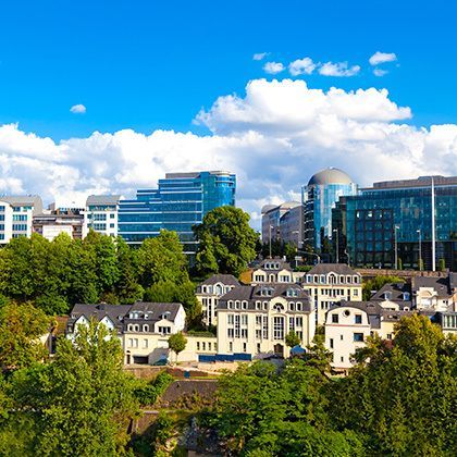 modern part of green downtown in luxembourg in front of modern buildings