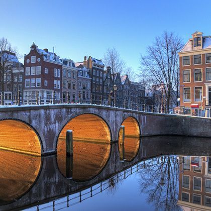 beautiful light on the bridges over the UNESCO world heritage canals in amsterdam