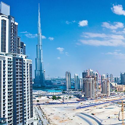panoramic view of the modern cityscape of dubai city downtown with blue sky