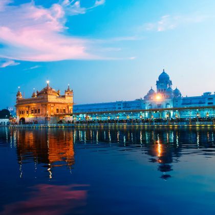 Golden Temple (Harmandir Sahib also Darbar Sahib) in the evening at sunset. Amritsar. Punjab. India