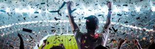 sports fan celebrating win with confetti falling