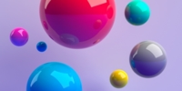 Colourful balls on pink background