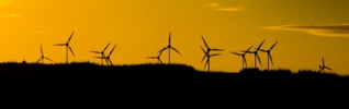 wind turbines at dusk