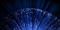 close up on the ends of many illuminated fiber optic strands