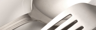 Abstract image of a silver spoon and fork