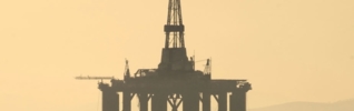 Oilrig in hazy sunset