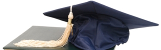 mortarboard on legal book