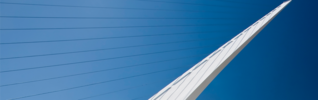 Abstract of bridge stanchions against blue sky