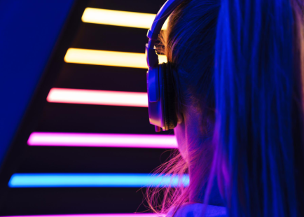 Image-closeup-of-beautiful-young-caucasian-woman-listening-to-music-with-headphones-840x600.png