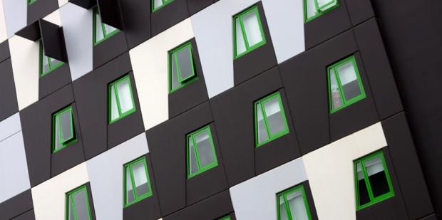 Modern unit design with distinctive green windows 840x420