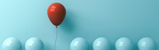 Red balloon pops up among cyan balloons_925x290.jpg