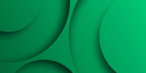 Abstract geometric background with green gradient vanishing circles
