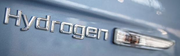 Image of the word Hydrogen on a vehicle door