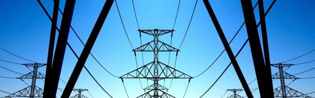 Electric power lines against blue sky 1280x400
