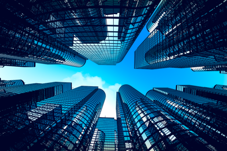 Low-angle-shot-of-modern-glass-city-buildings-during-sunny-day-900x600.png