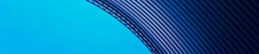 Abstract background spiral metal arch on blue sky 1920x400.jpg