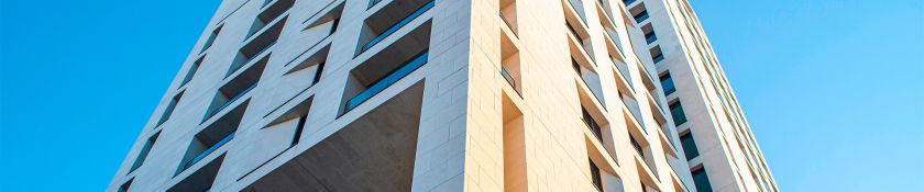 white building against sky 1920x400.jpg