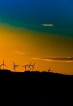 Landscape with windmills farm for clean energy at the sunset
