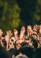 Hands raised in protest cover